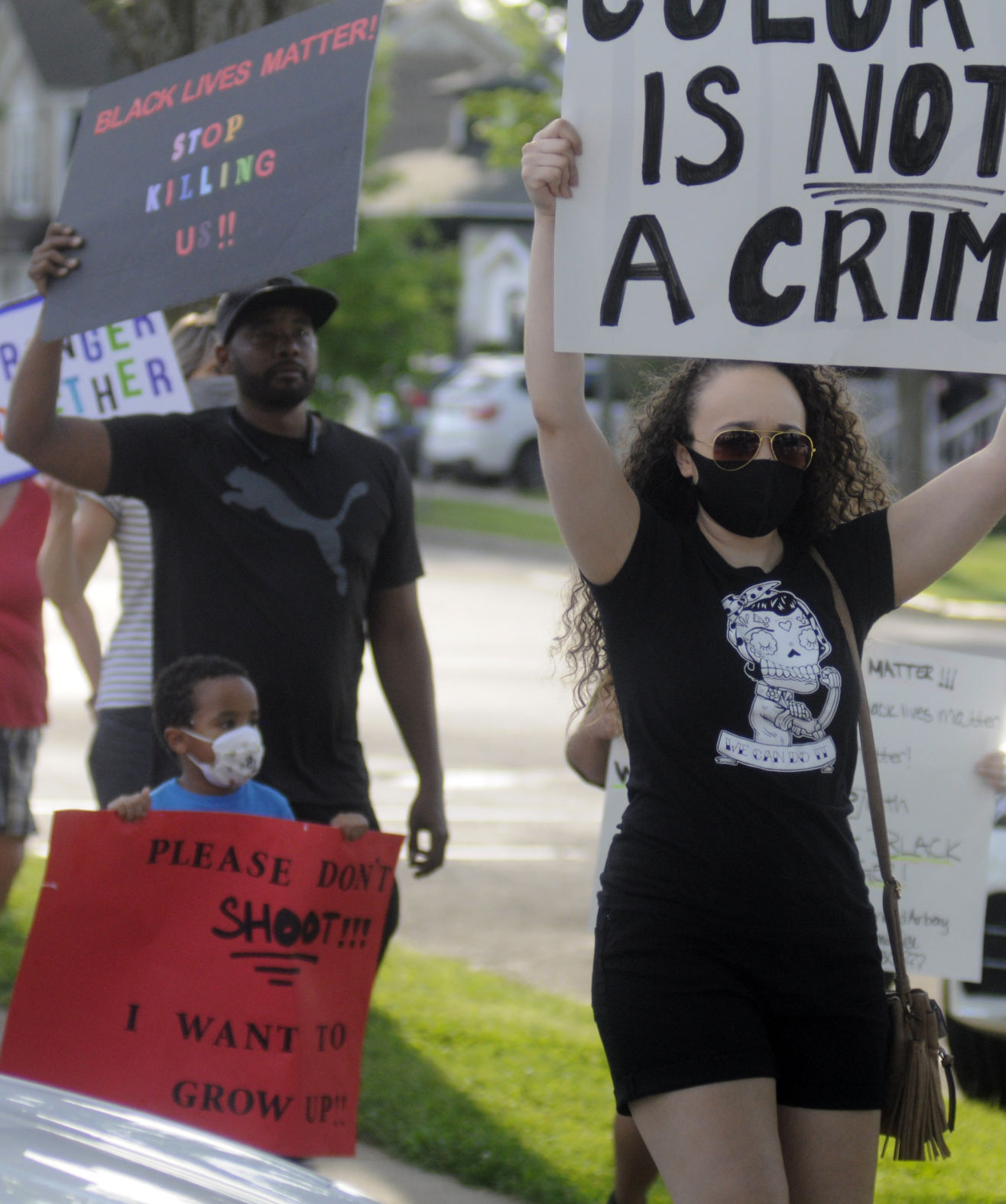 Demonstrators march on Geneva Street